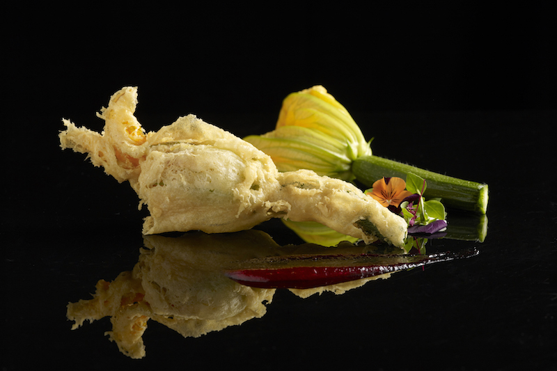 Zucchini flower tempura stuffed with wasabi shrimps paste