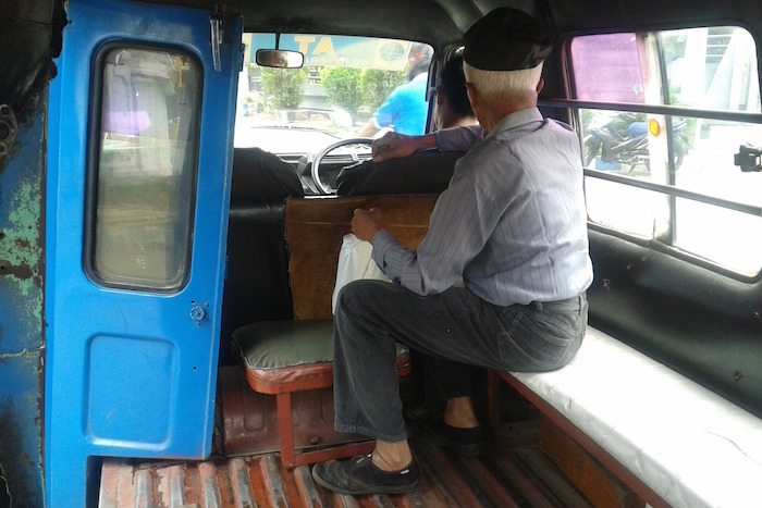 passenger in angkot indonesia