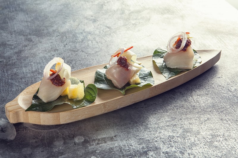 Hamachi sashimi with betel leaf